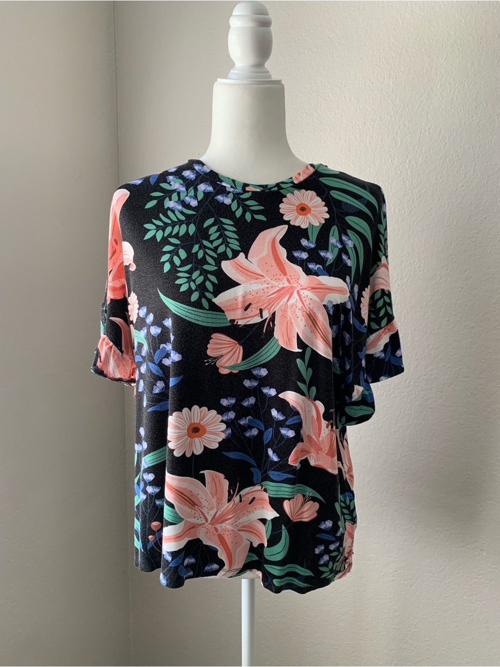 LuLaRoe Black Short Sleeve Top with Coral and Green Floral Print